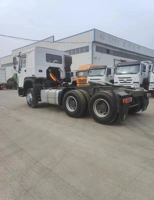 아프리카 시장에 대 한 높은 유료량 Sinotruk HOWO 6X4 트랙터 트럭 머리 왼손 운전